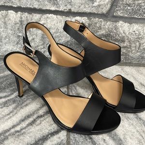 Black Michael kors black buckle heels she size 9 gently used Leather